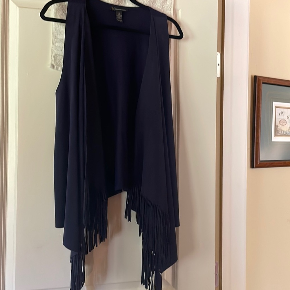 Like new never worn! Fringe vest so sporty for those casual or edgy outings!